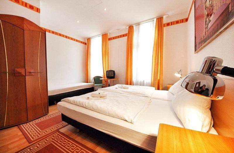 City Hotel Storch Colónia Quarto foto